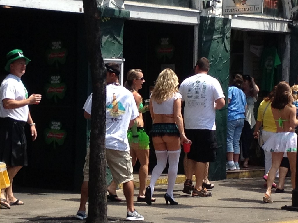 Duval St is already a madhouse and everyone is wearing green.  This poor lady forgot her pants!