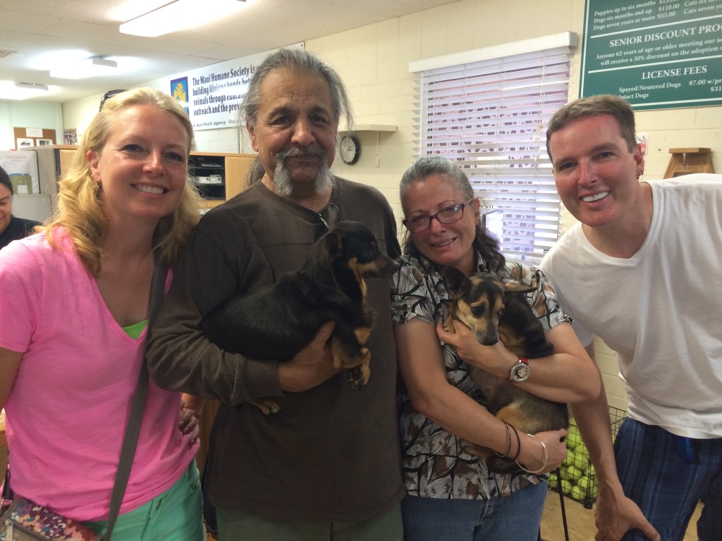 We walk into the humane society and we hear, "Oh there they are! We've been waiting for her!" Huh?  Mauians Earl and Rosa were waiting for Bonita, so they could adopt her with her sister!! How incredible is that?? Here we are with the happy family... A very good day indeed.