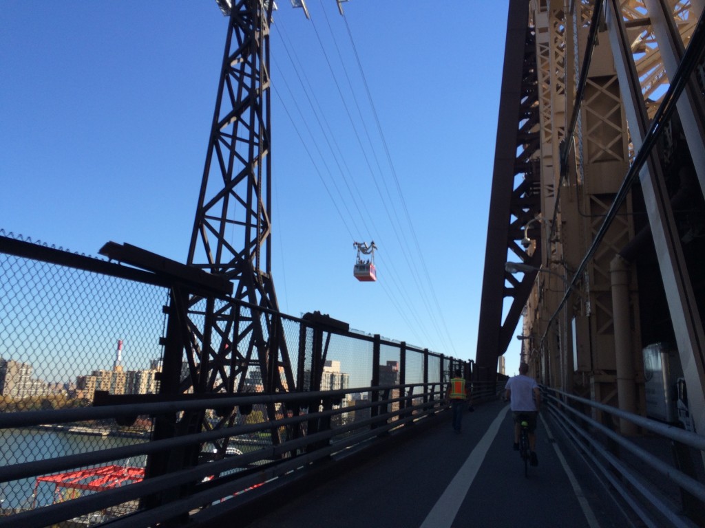 Bright blue, beautiful day today. The Queensboro Bridge beckoned us out of Manhattan. It was interesting to see the Roosevelt Island tramway just sitting there, suspended over the East River. 