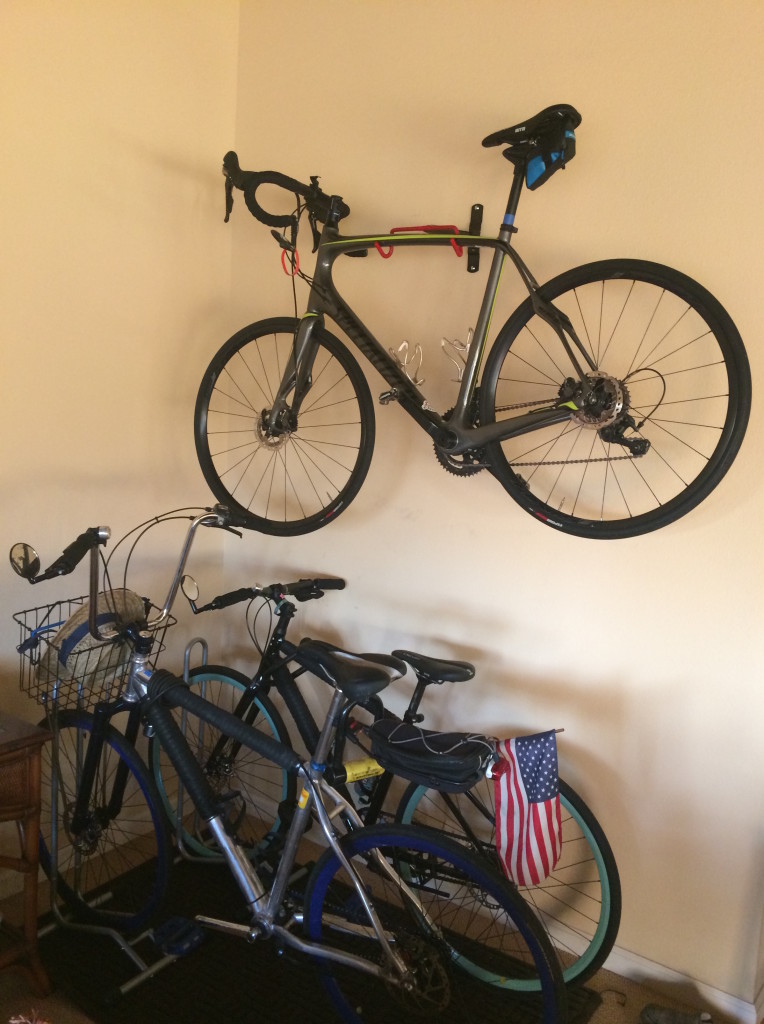 Bonus pic: our condo's indoor bike parking. (Ron's very proud of himself for finding a stud in the wall). 