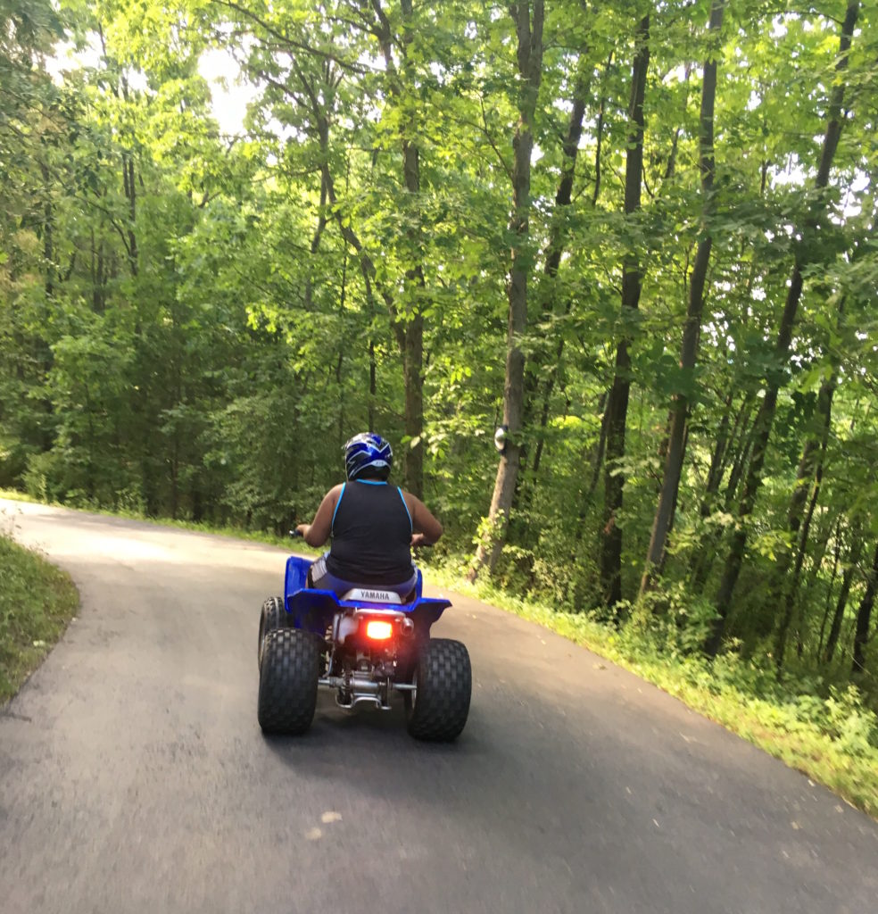 He learned to ride the quad and loved zooming down the driveway and across the front field. Well, until he saw a bear up close and personal. 