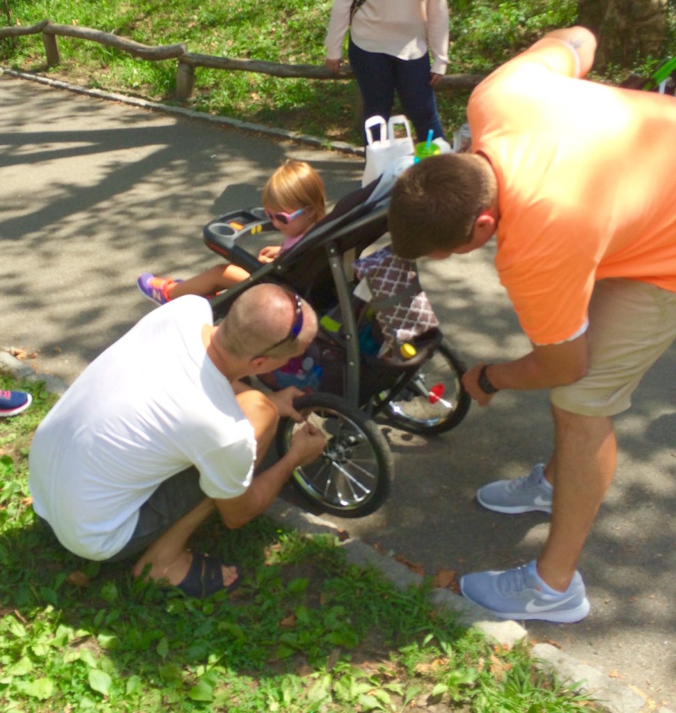 A woman approached us as we sat chatting with our cousins in Central Park. "Are those your bikes?" she asked. "Yes..." She needed help, two tires of her child's stroller were flat. Luckily for her, Ron had a spare CO2 cartridge and got them rolling in no time!